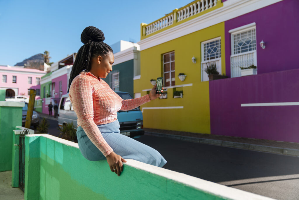 side-view-woman-using-smartphone-outdoors